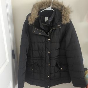 Woman's black puffer jacket